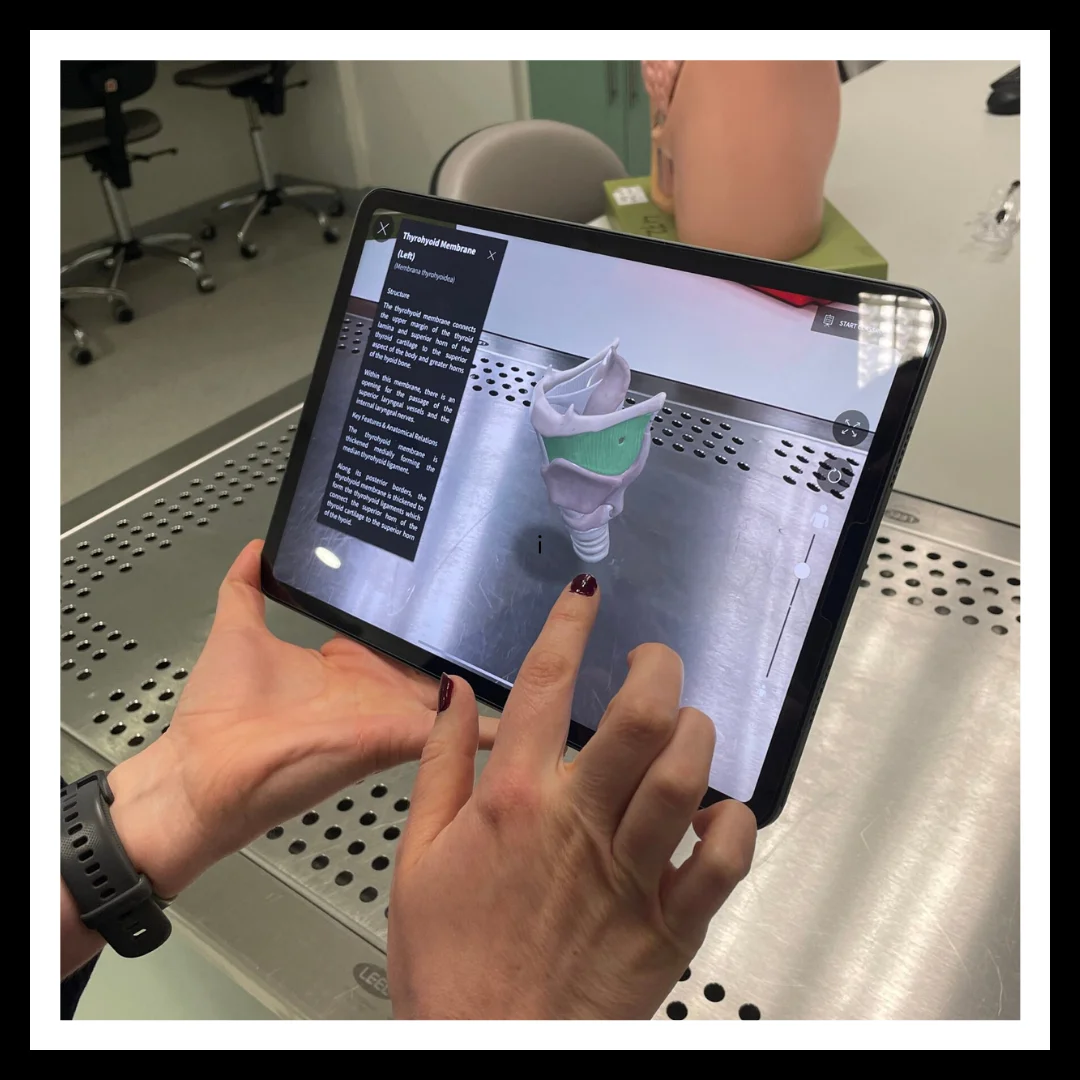 iPad showing Complete Anatomy App in Augmented Reality mode